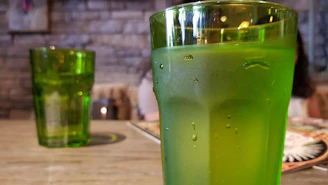 Close-up of a Frostara tumbler with condensation beads on a sunny day.