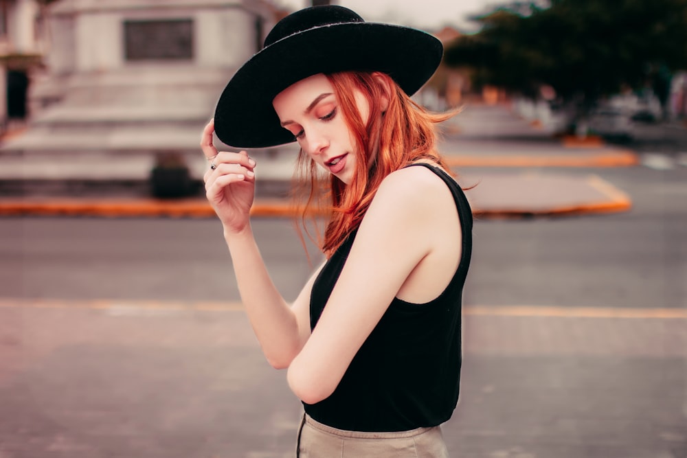 woman wearing black hat photo