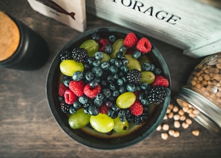 assorted fruits on gray metal bowl