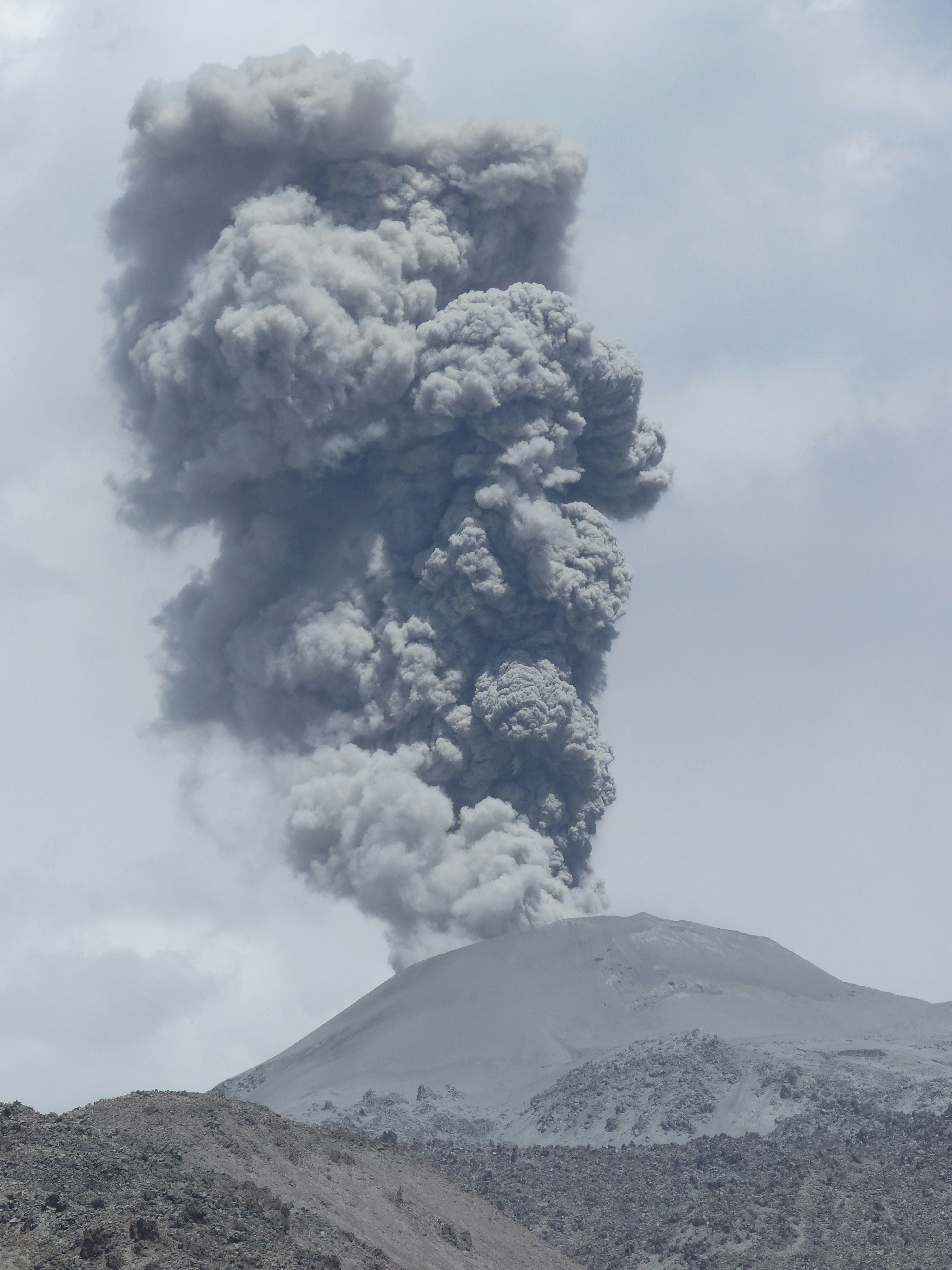 volcano under cloudy sky during daytime