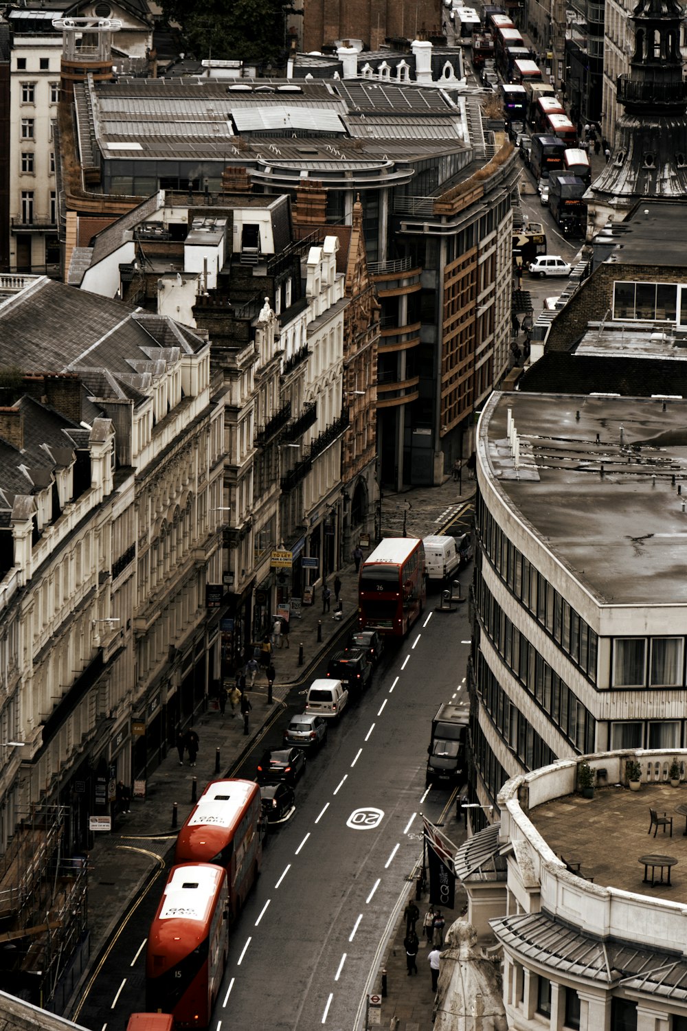 three red buses