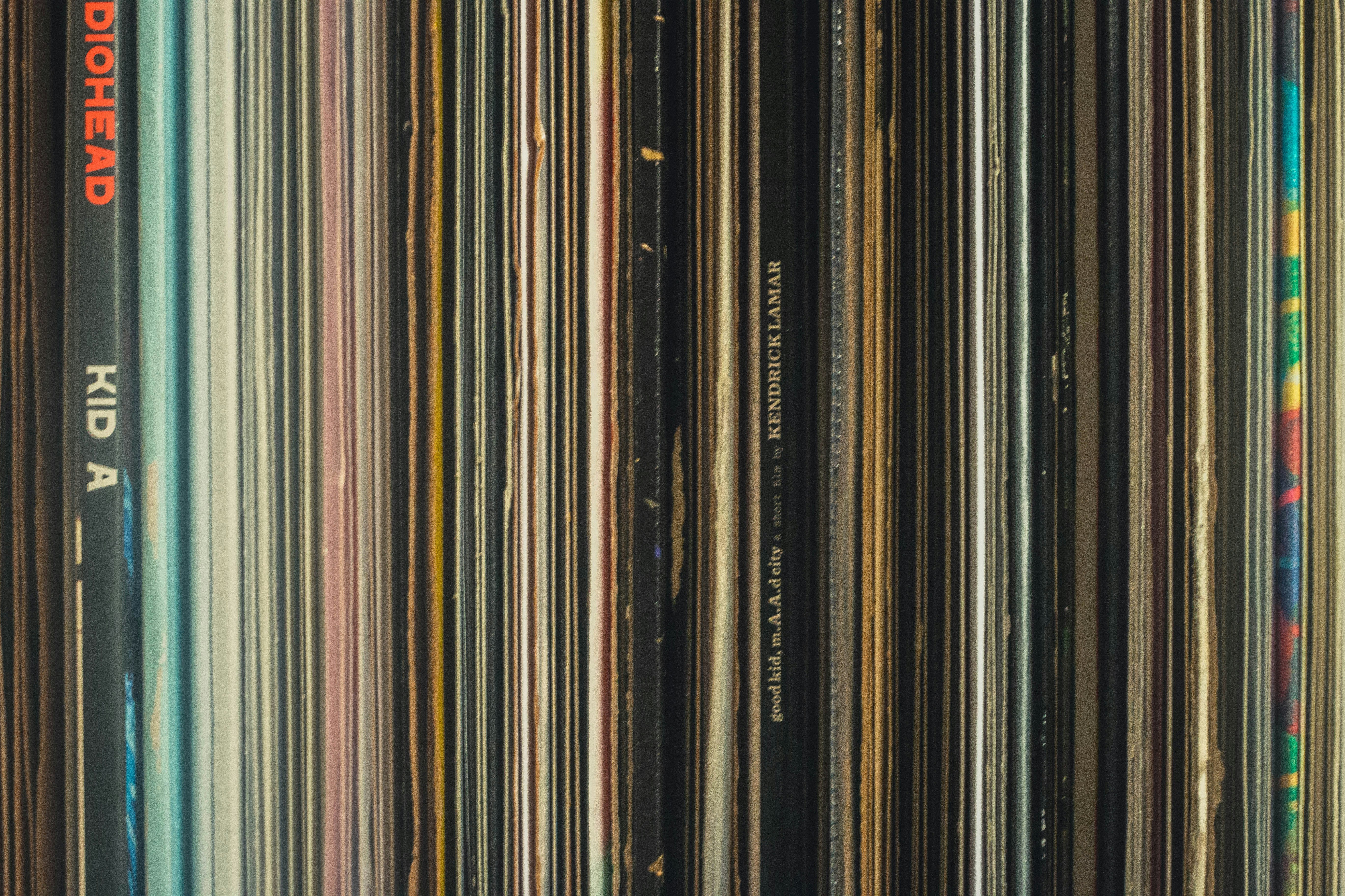 Collection of vinyl records displayed with album artwork showing underground music releases