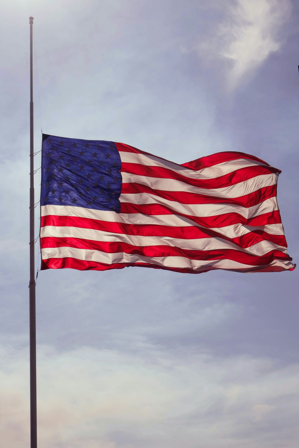 U.S. flag under blue skies