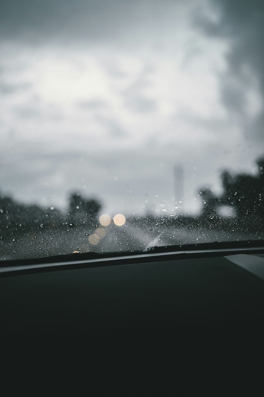 a view of a city from inside a car