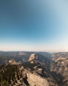 canyon under blue sky digital wallpaper
