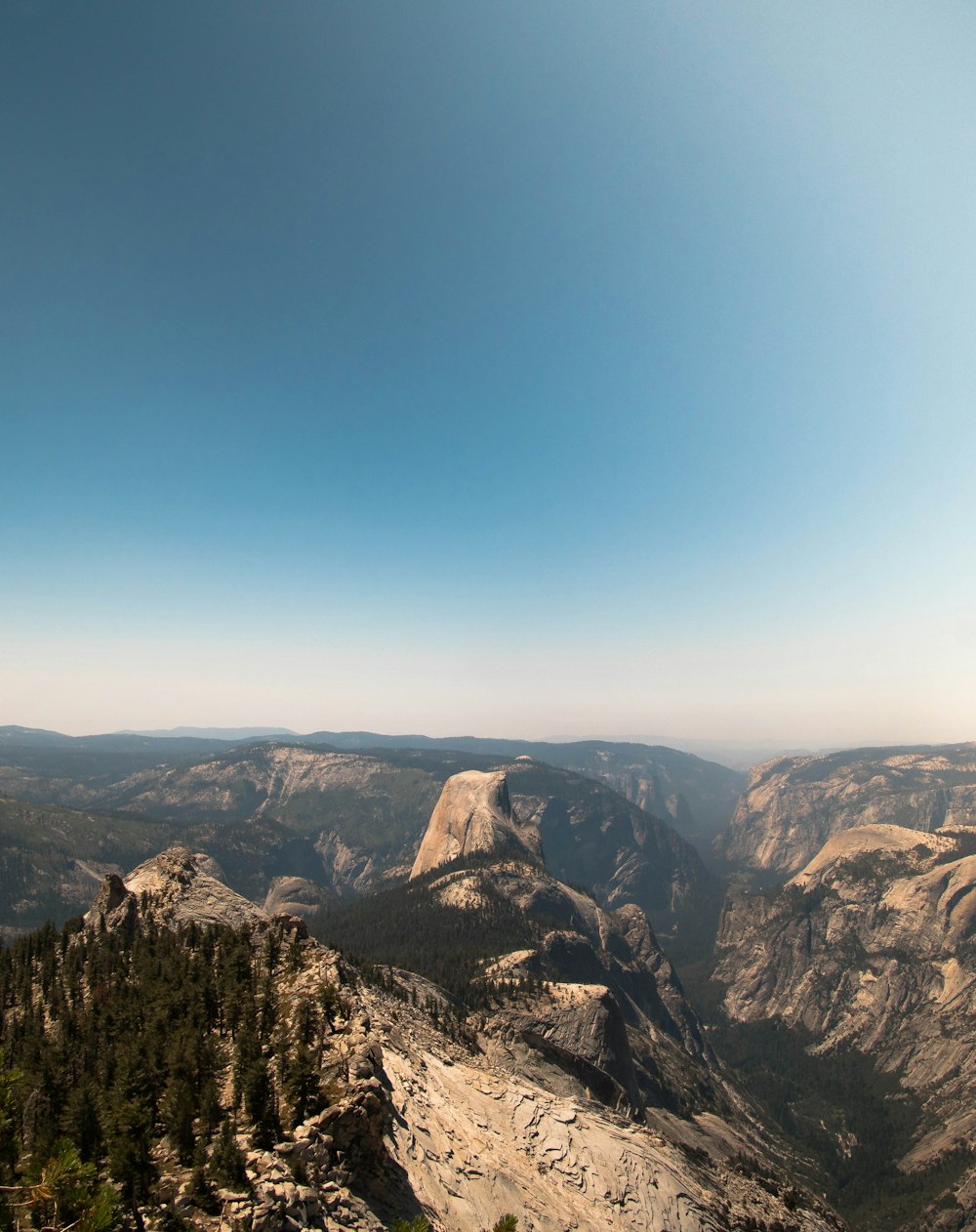 canyon under blue sky digital wallpaper