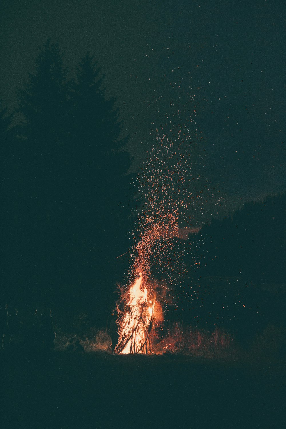 burning wood at night
