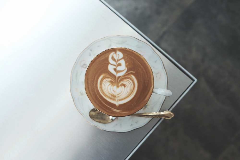 mug with coffee on saucer