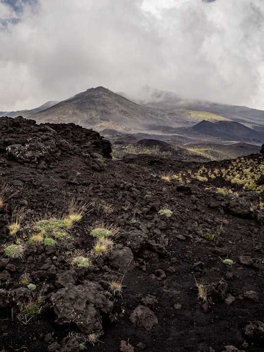 mountain alps under gray sky in Mount Etna Italy