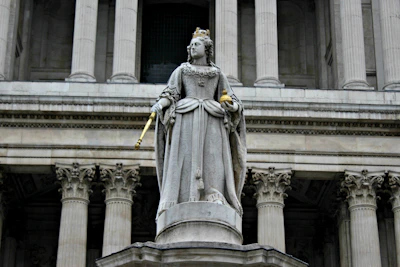 The Emperor holding a scepter and orb, symbolizing control and stability.