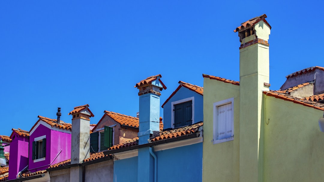 several multicolored concrete houses, Burano