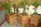 Close-up of elegant cement and metal planters displayed on a modern patio.