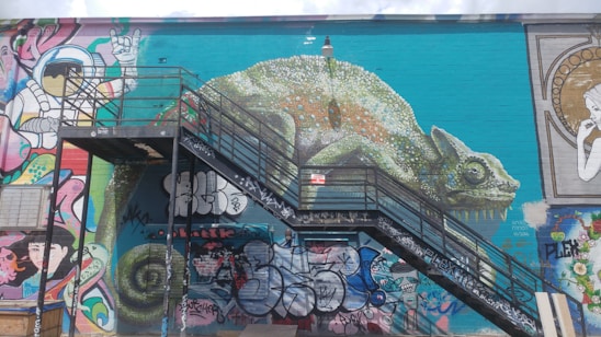 A vibrant mural showcasing Chambeh's unique graffiti style, reflecting urban culture.