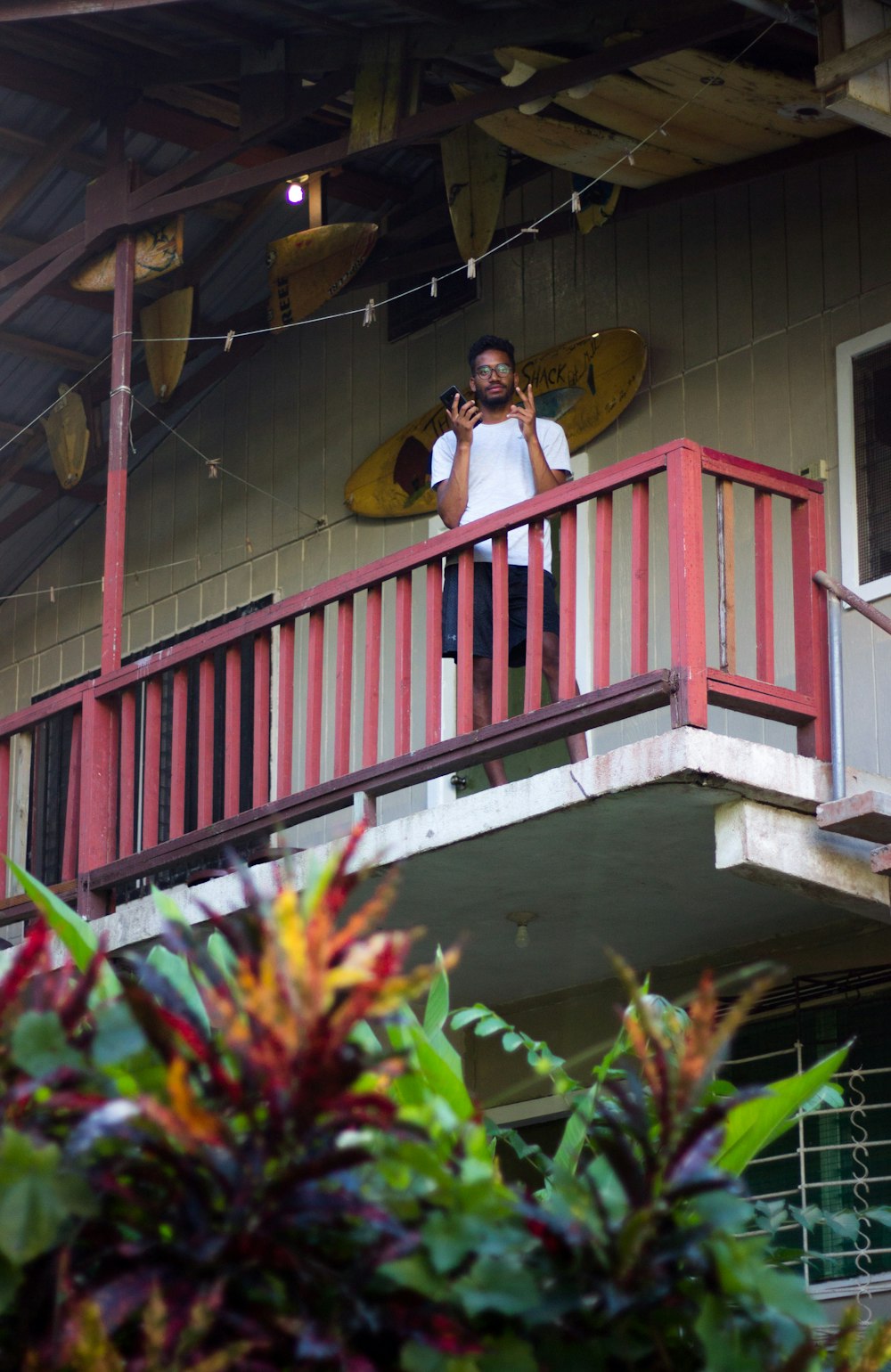 man standing on terrace