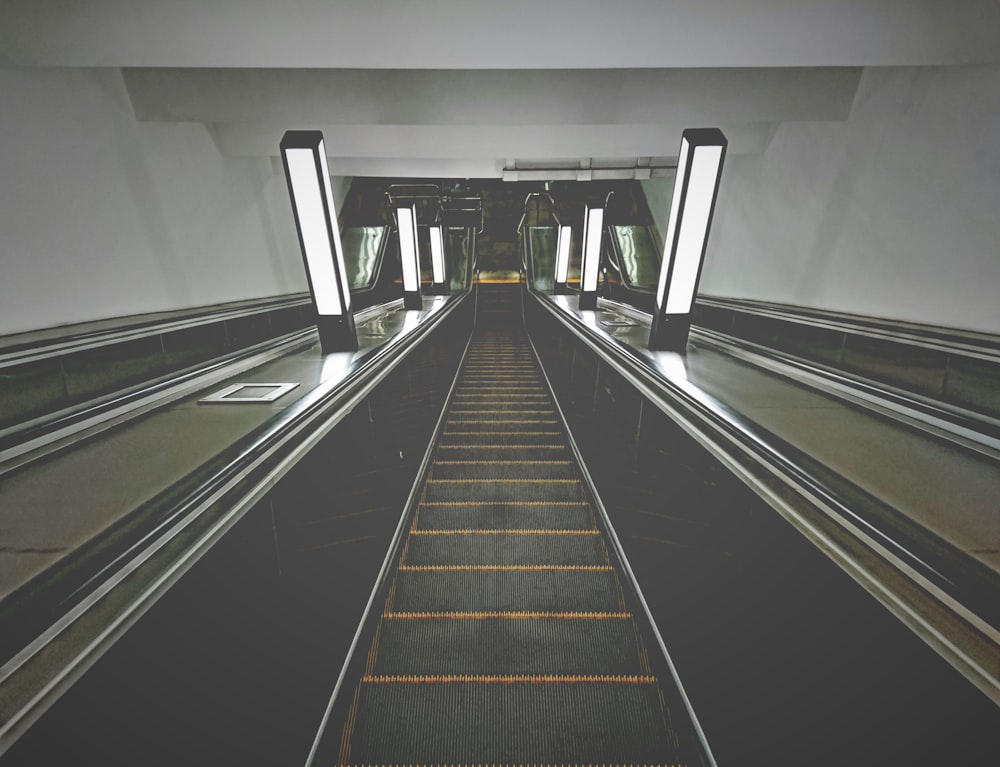 black and gray empty escalator
