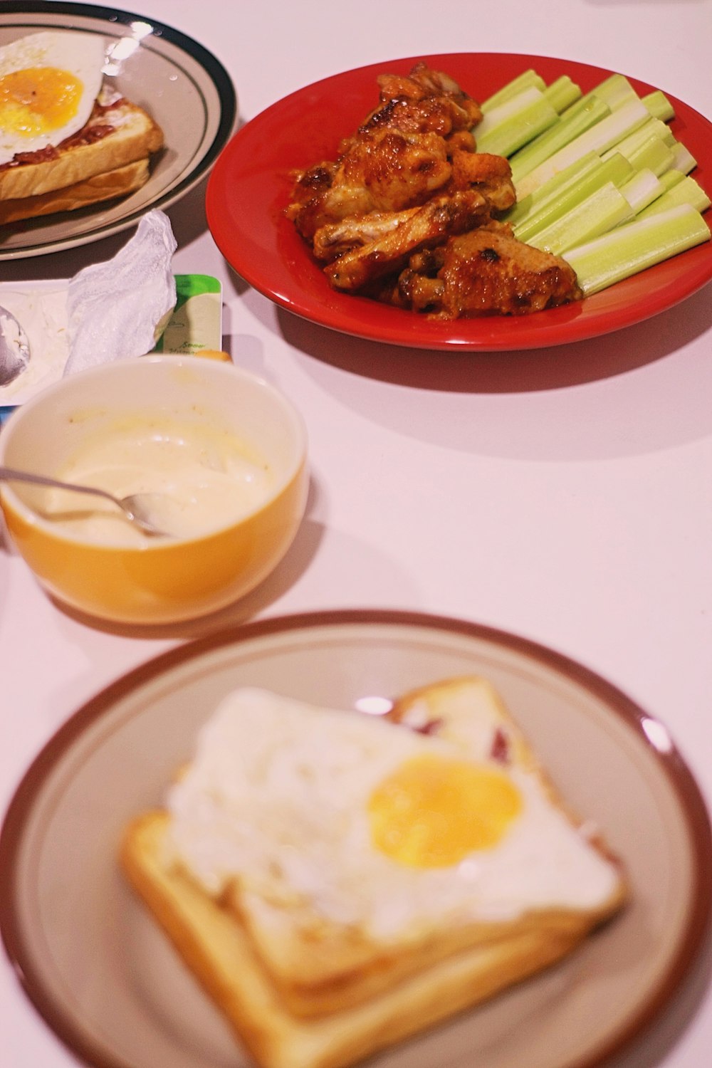 grilled meat with fried egg and bread