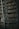 library shelf near black wooden ladder