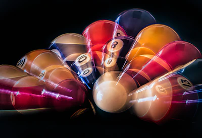A dynamic shot of a powerball game ball bouncing inside the cage