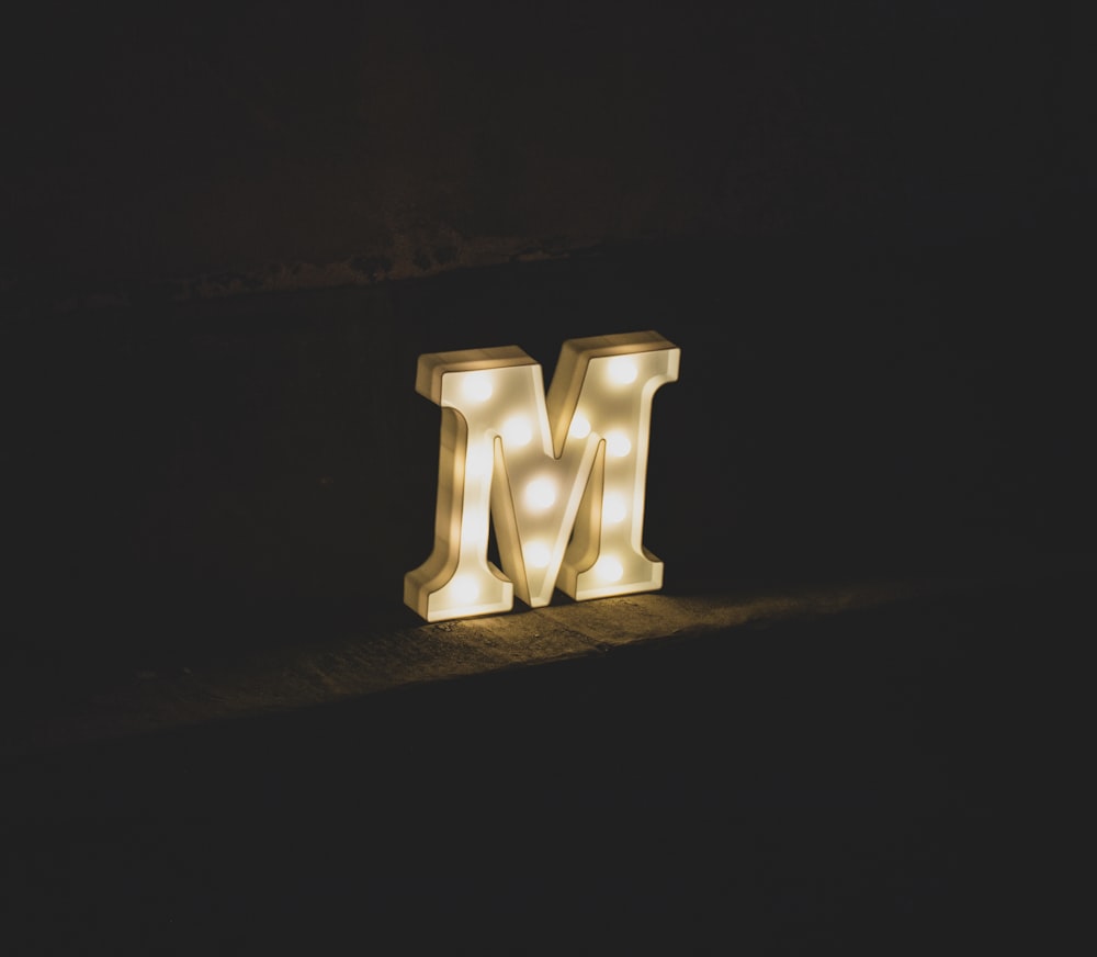 white M marquee letter signage