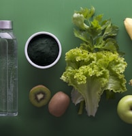 assorted fruits and vegetables on green surface