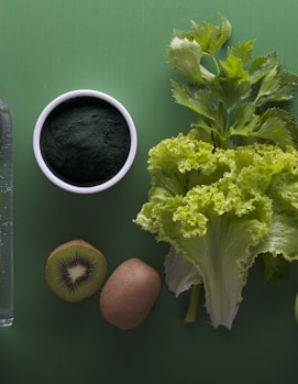 assorted fruits and vegetables on green surface