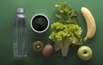 assorted fruits and vegetables on green surface