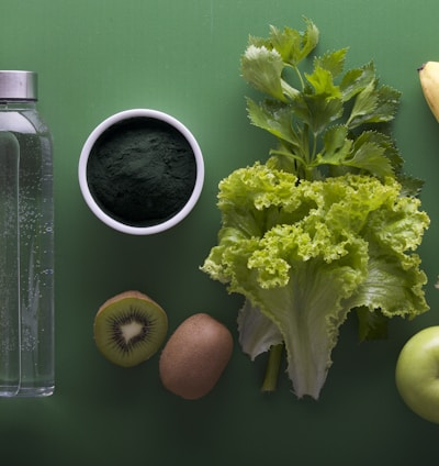 assorted fruits and vegetables on green surface