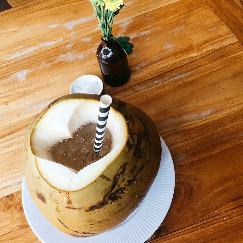 coconut dessert with straw