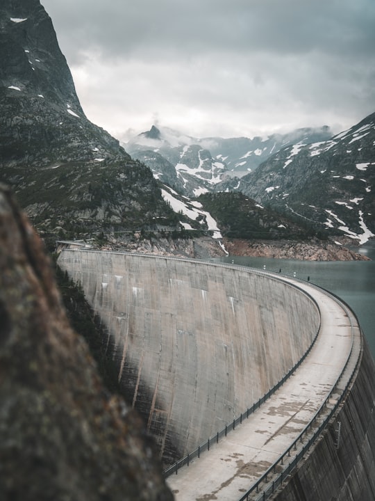 close up photography of dam near mountain in Lac d'Emosson Switzerland