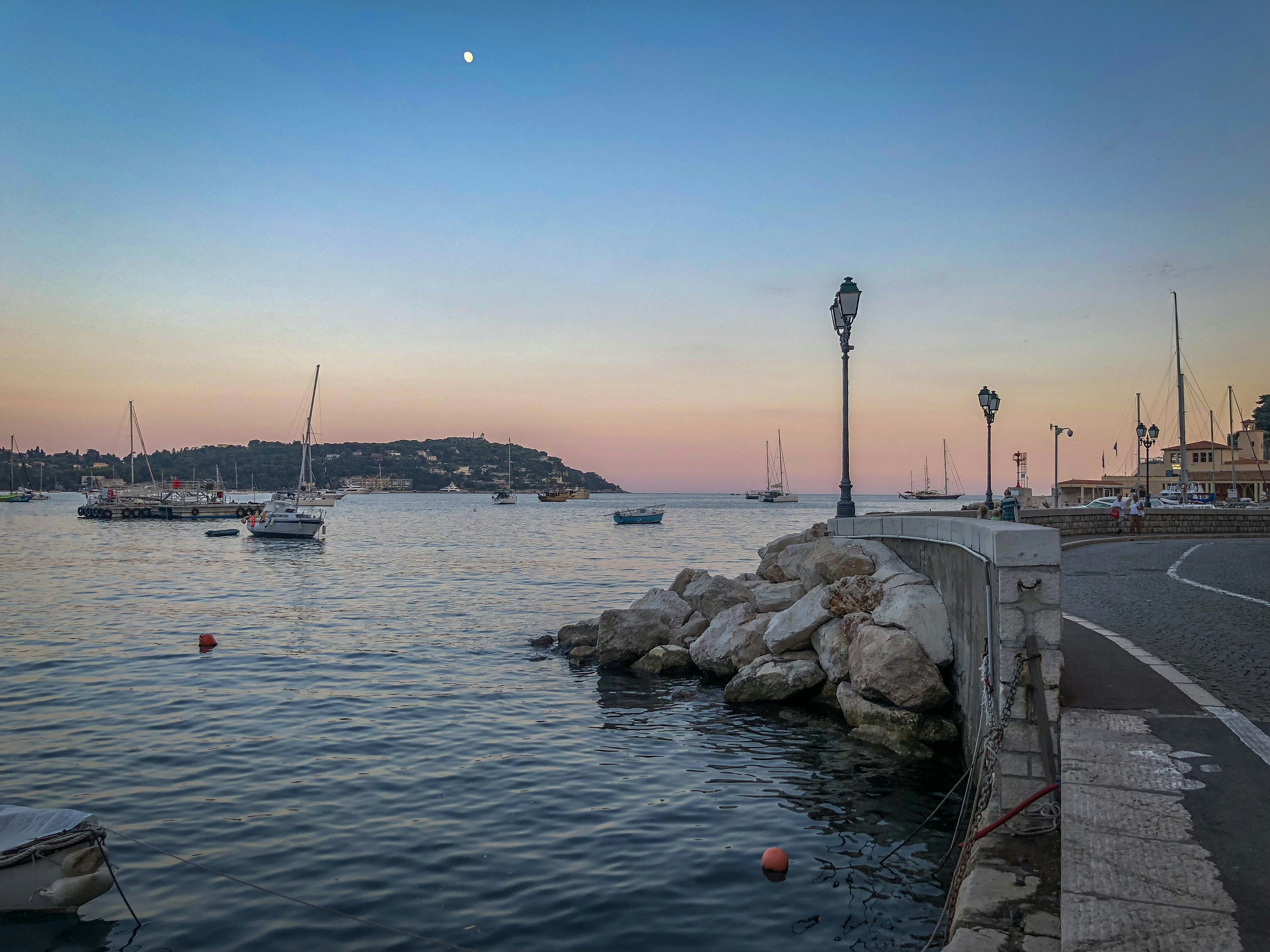 boat on body of water near the city, Sunset on the Mediterranean