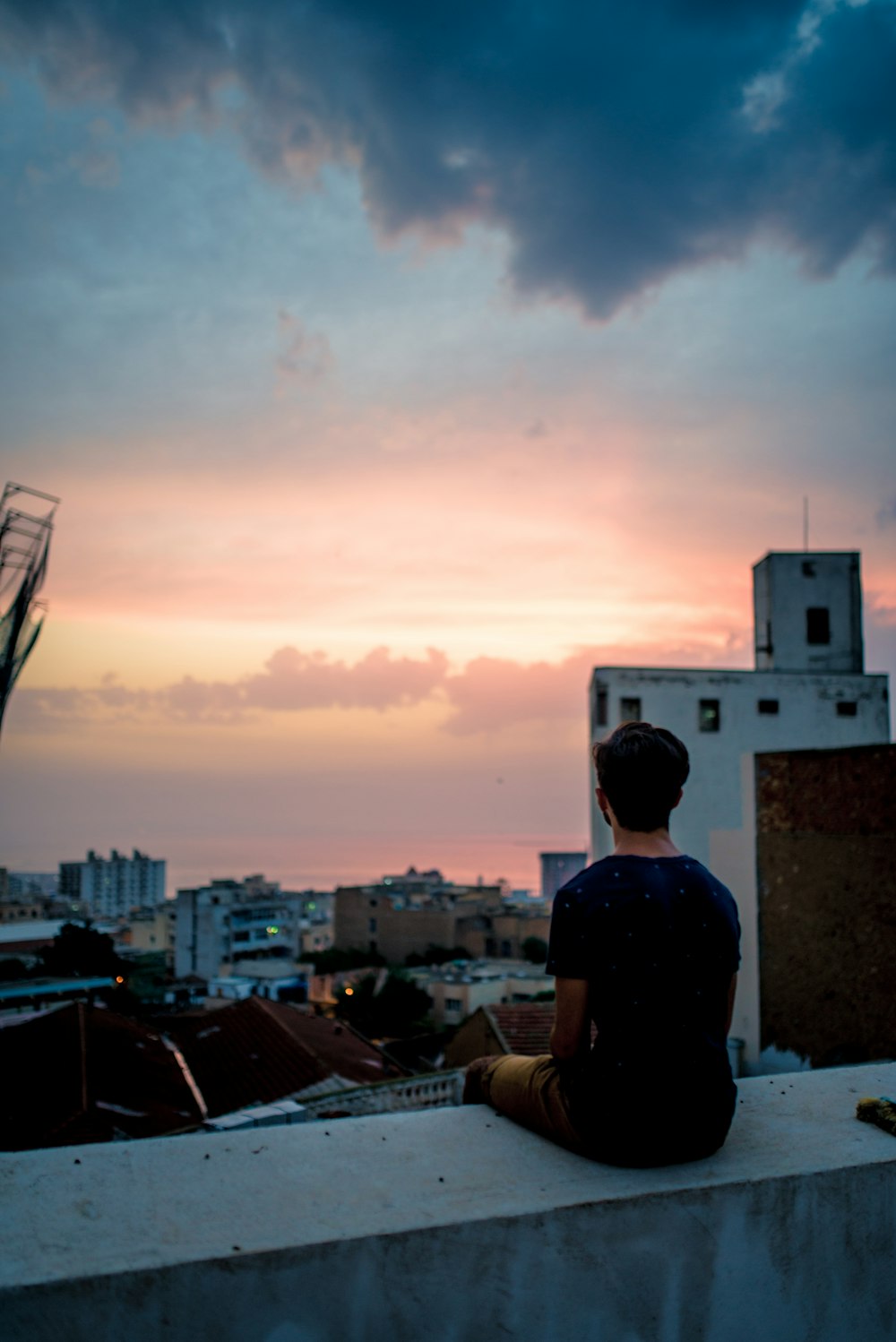 man sit on terrace