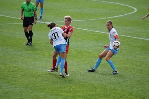 A vibrant soccer field with players in action during a match.
