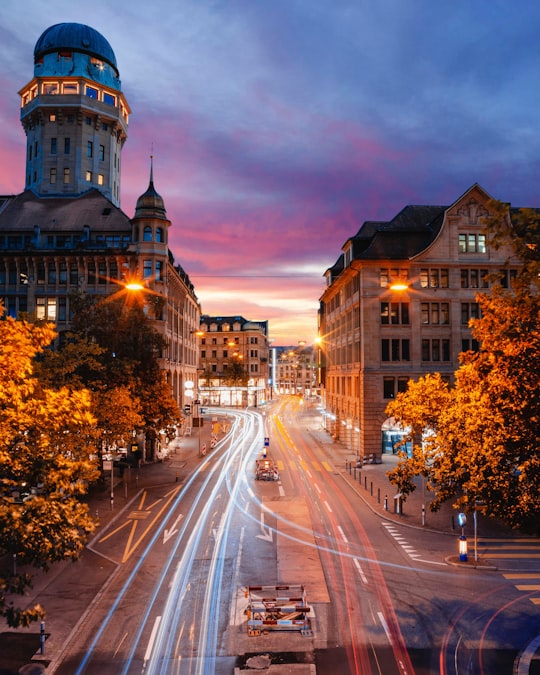 timelapse photo of cars passing by building in Urania Sternwarte Switzerland