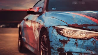 Close-up of a vibrant car wrap design featuring bold colors and sharp lines