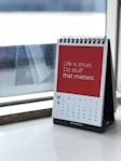 spiral freestanding calendar on white surface