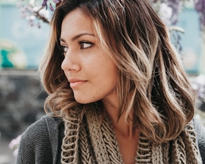 woman wearing gray scarf
