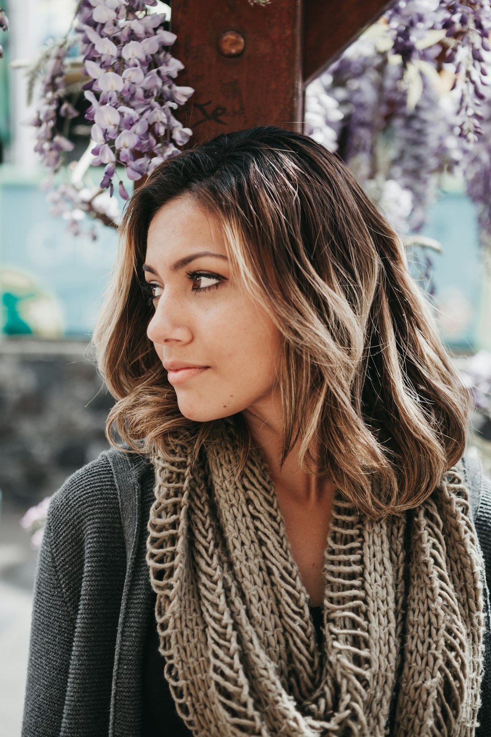 woman wearing gray scarf