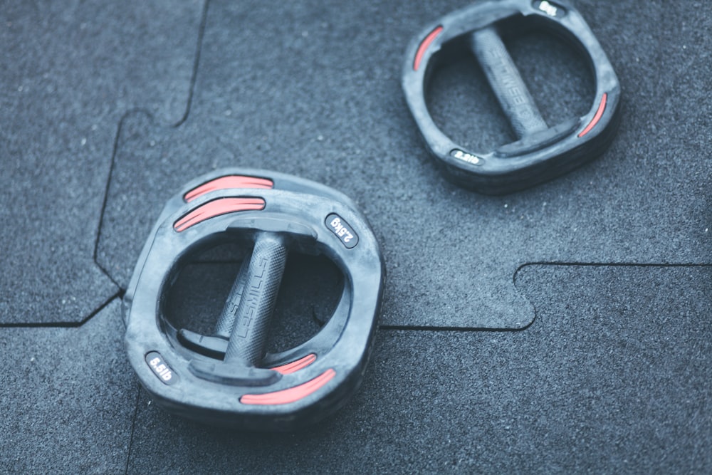 a close up of a pair of handles on a bench