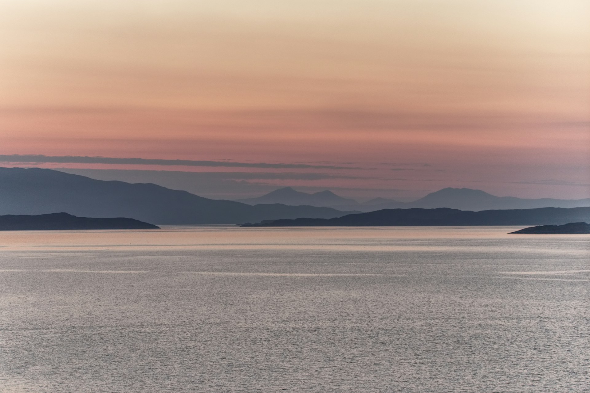 landscape photography of ocean and mountains