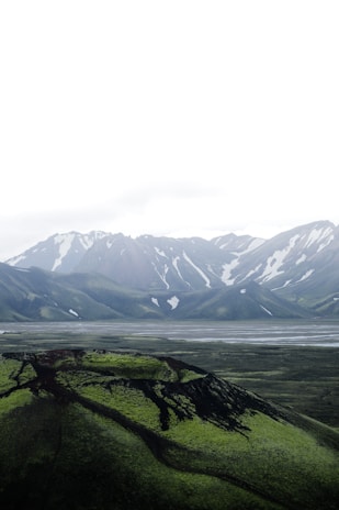 A serene landscape of mountains symbolizing stability.