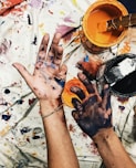 person with painted hands