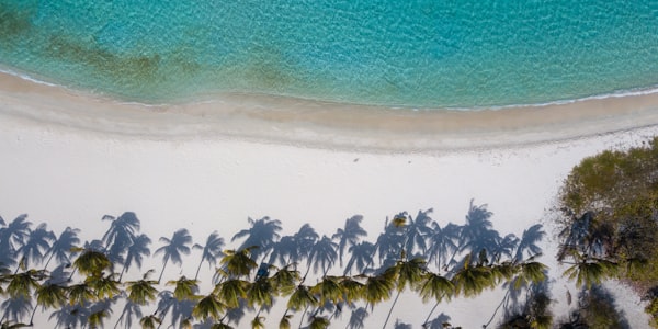 Crystal clear turquoise water on white sand beach