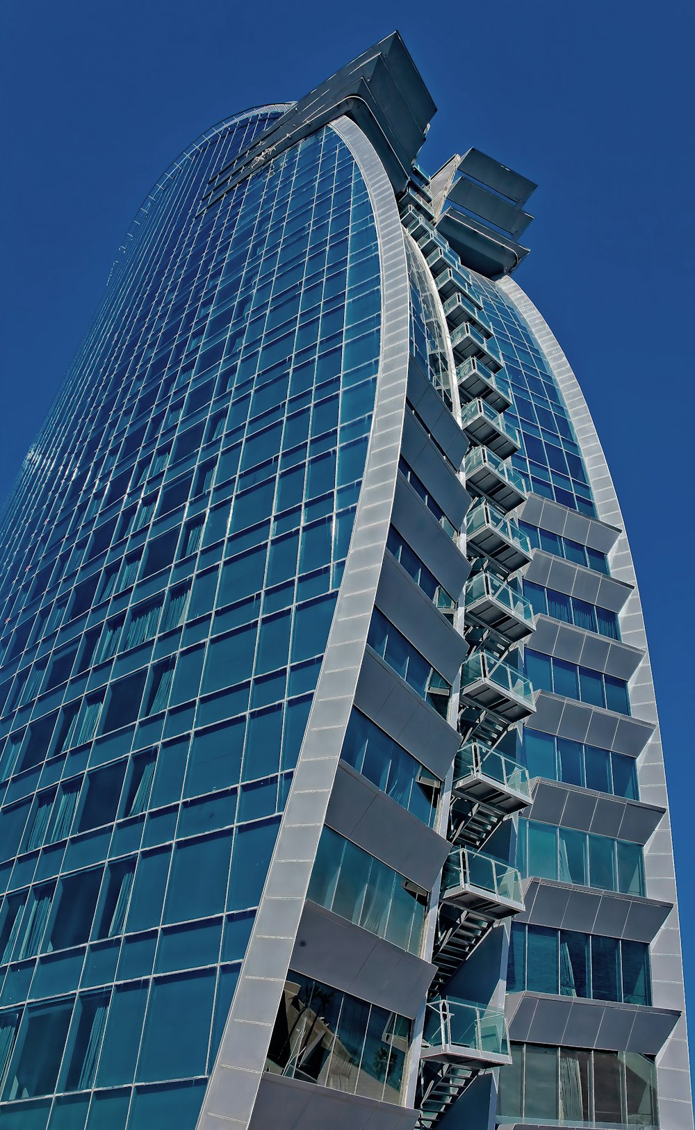 white and blue high-rise building