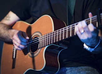 person playing guitar