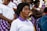 woman wearing white polo shirt closing eyes