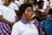 woman wearing white polo shirt closing eyes