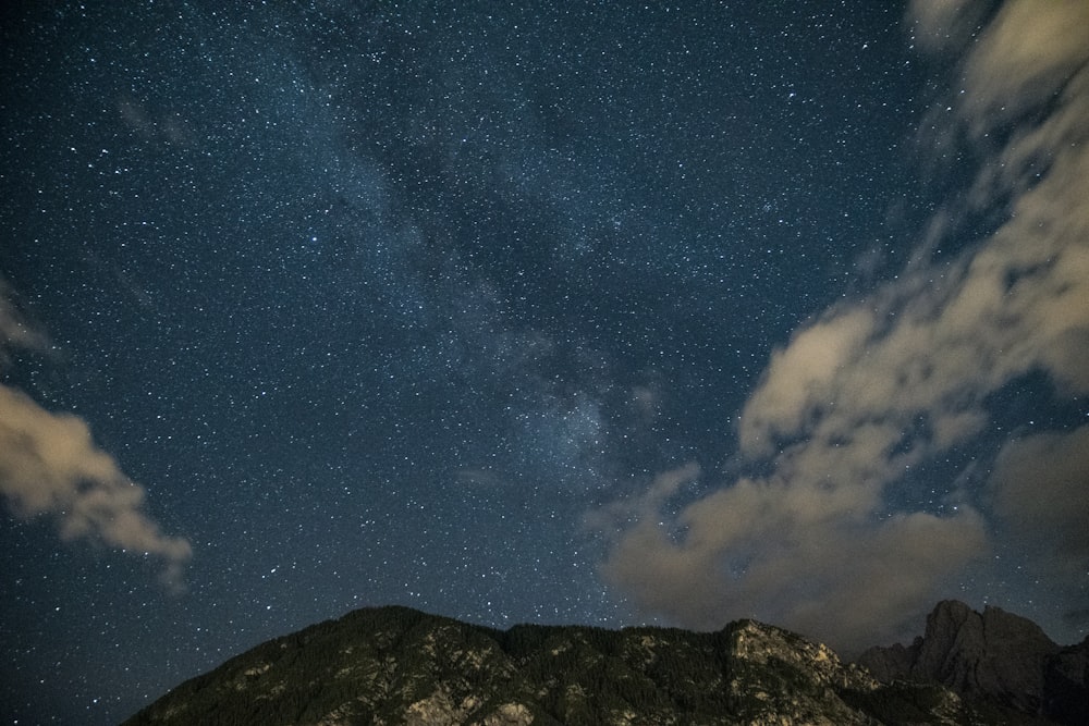 mountain alps with clouds