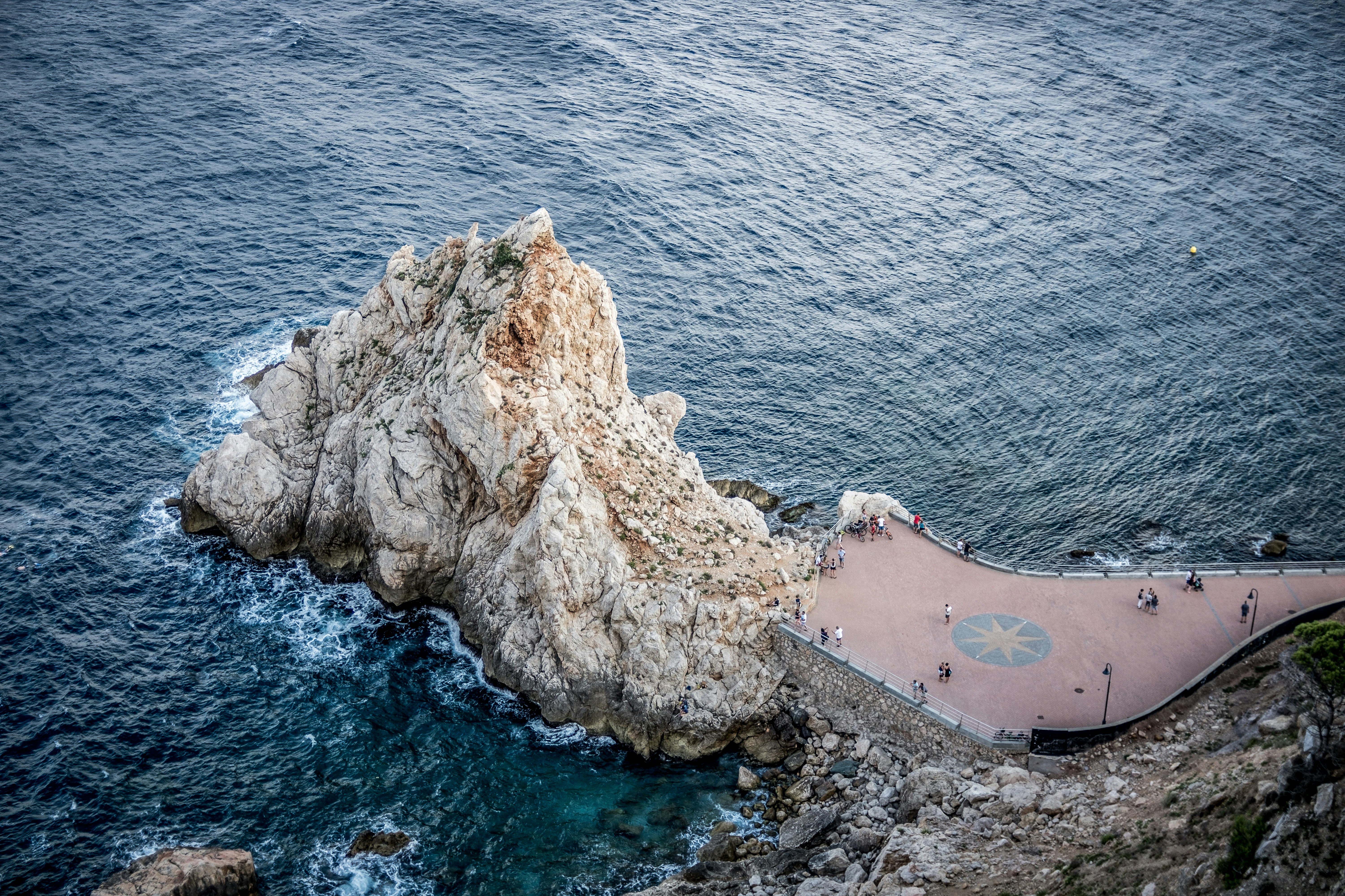 aerial photography of cliff on body of water, 