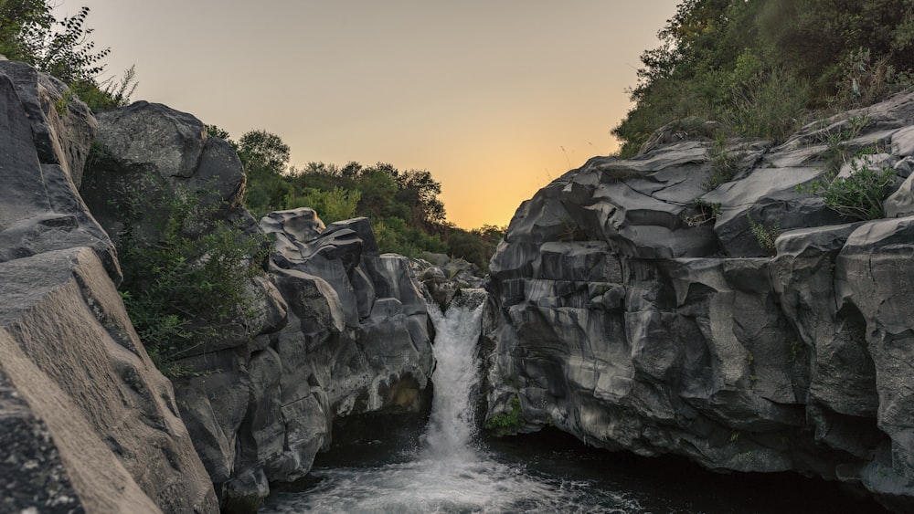 rock formation with waterfalls