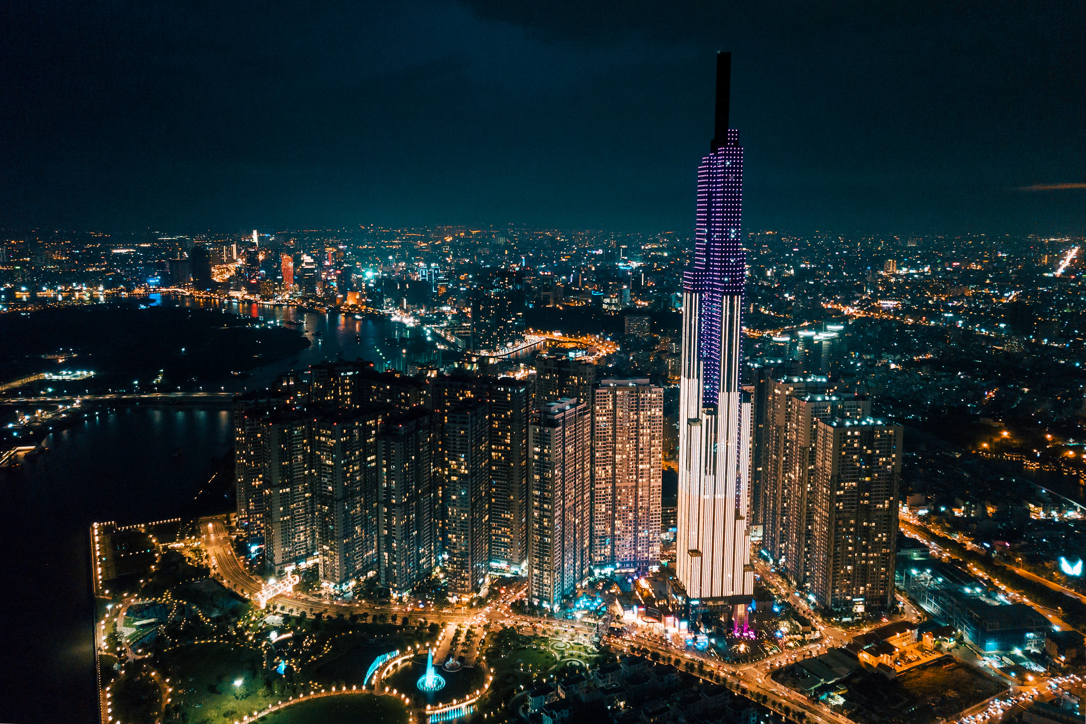 Saigon at night with street food, plastic stools and atmospheric light